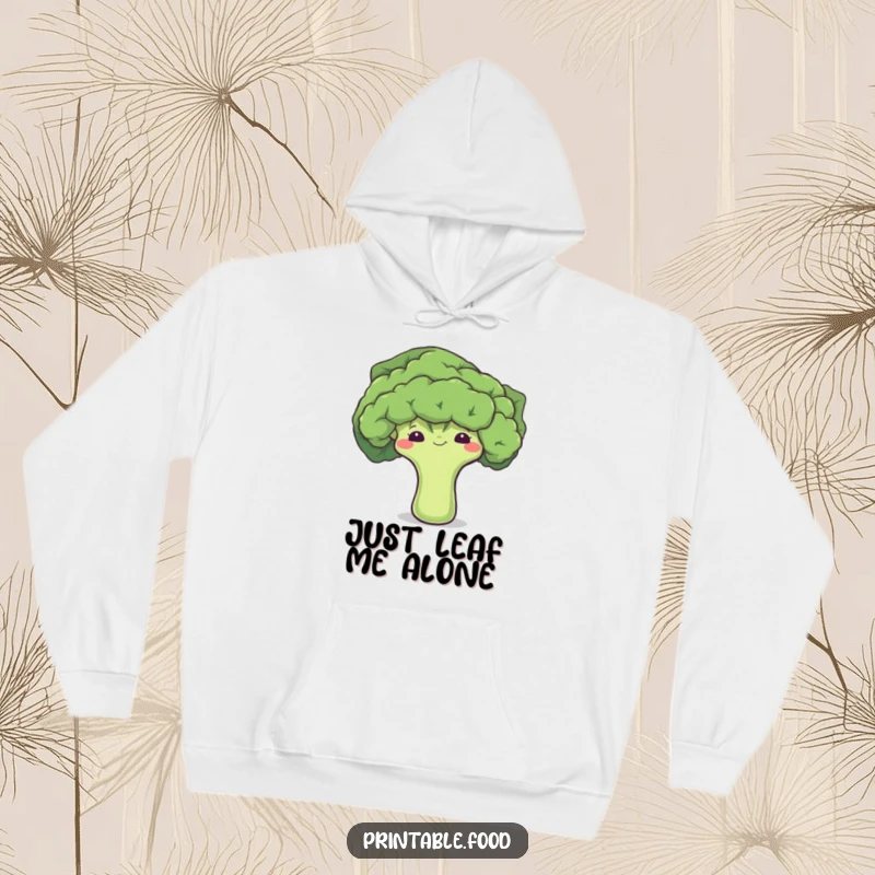 Funny hoodie showcasing a bashful broccoli floret hiding behind a leaf, adding a touch of gentle humor.