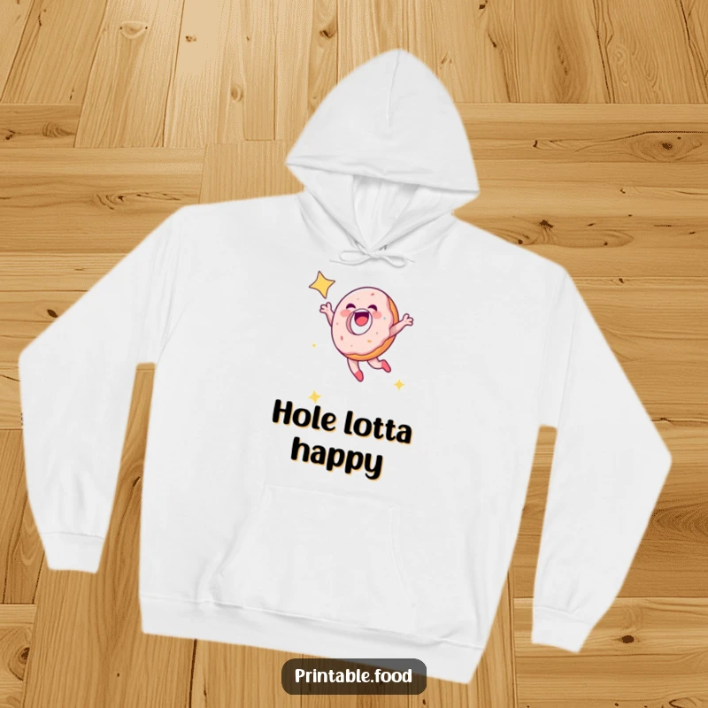 Funny laughing doughnut character leaping into a starry sky on a comfortable hoodie, ideal for cozy cosmic humor.