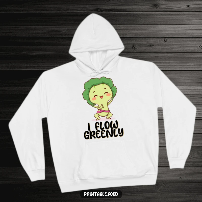 Funny Hoodie: Broccoli character in a serene yoga pose, radiating calmness and healthy humor, ideal for relaxation.