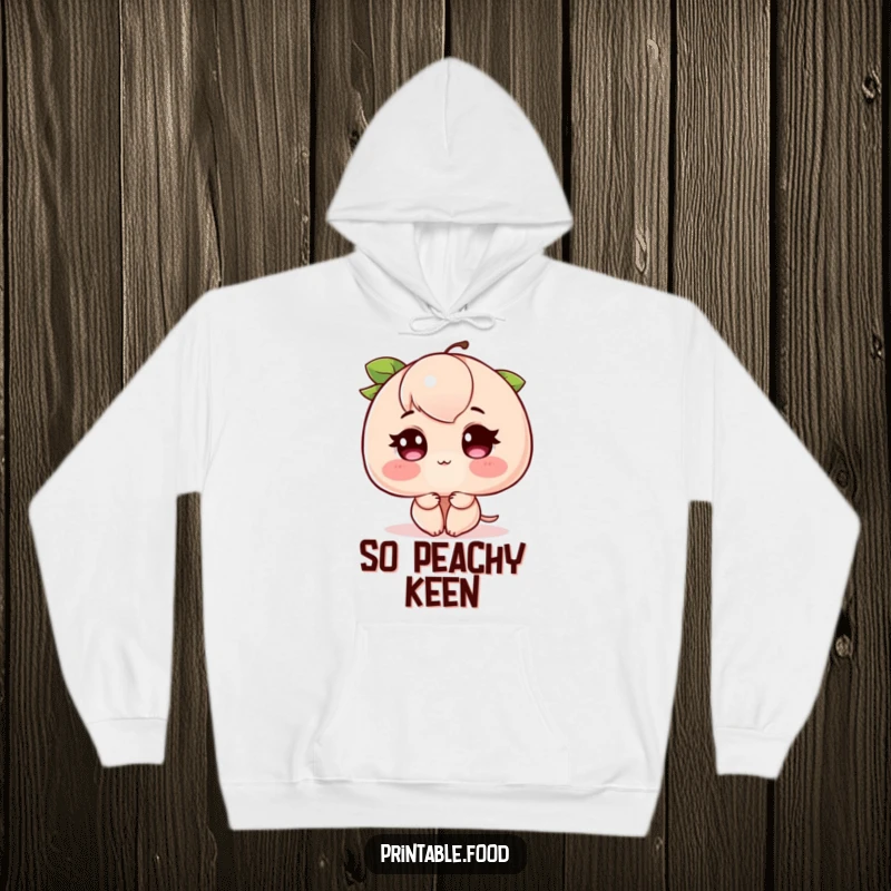 Funny Blushing Peach Hoodie: A warm hoodie featuring a blushing peach with vibrant rosy cheeks, exuding adorable shyness.